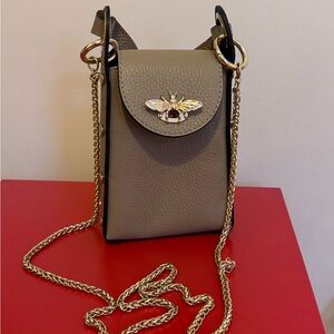 Elegant Leather Crossbody Bag with Bee Accent